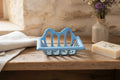 Porte-savonnette ancien en fonte émaillée bleue – 12 x 9 x 5 cm – Brocante
