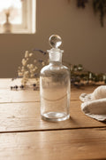 Flacon d’apothicairerie ancien en verre avec bouchon givré – 12 cm