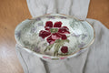 Navette de table ancienne en faïence de Lunéville Keller & Guérin, décor floral rose et mauve, 22 cm de long.