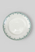 Compotier ancien Saint-Amand réf. 4004 en faïence fine, décor géométrique vert. Plat sur pied début XXe siècle, diamètre 23,5 cm.