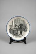 Assiette parlante ancienne Boulenger Choisy-le-Roi, série À Madagascar n° XII. Terre de Fer fin XIXe, décor historique colonial, diamètre 20 cm.