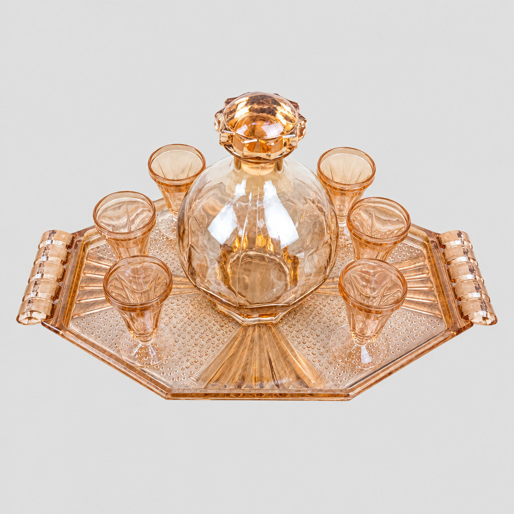 Service à liqueur Art déco en verre rose avec carafe, six verres et plateau