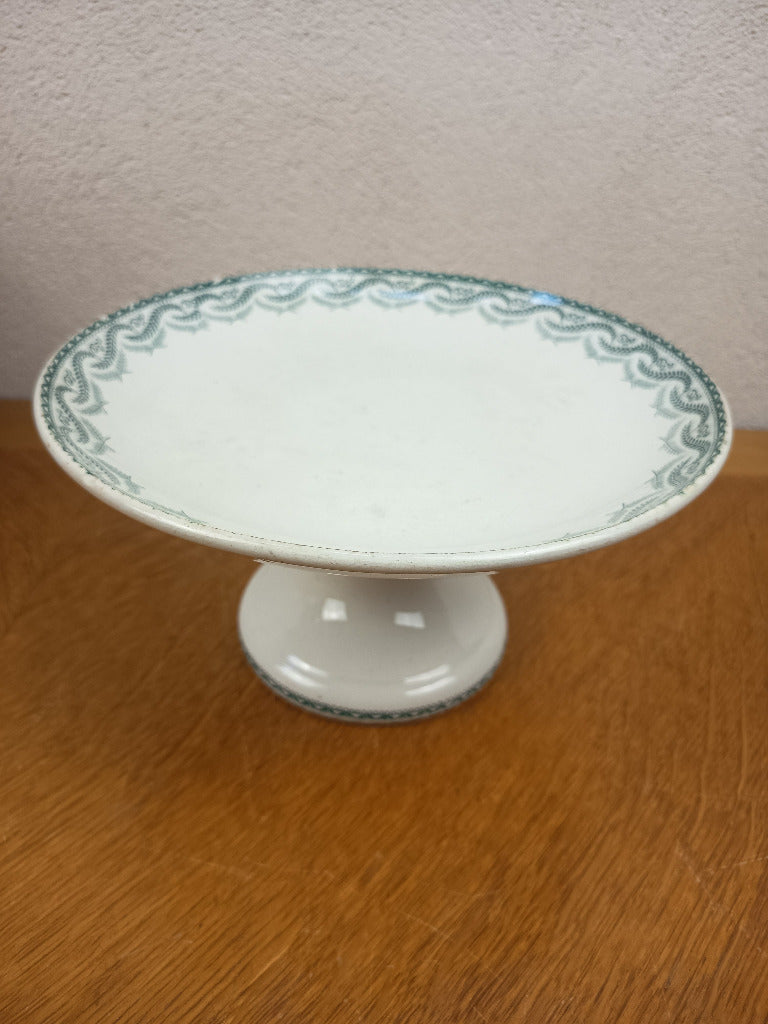 Compotier ancien Saint-Amand Réjane sur pied, en faïence blanc crème à décor végétal vert