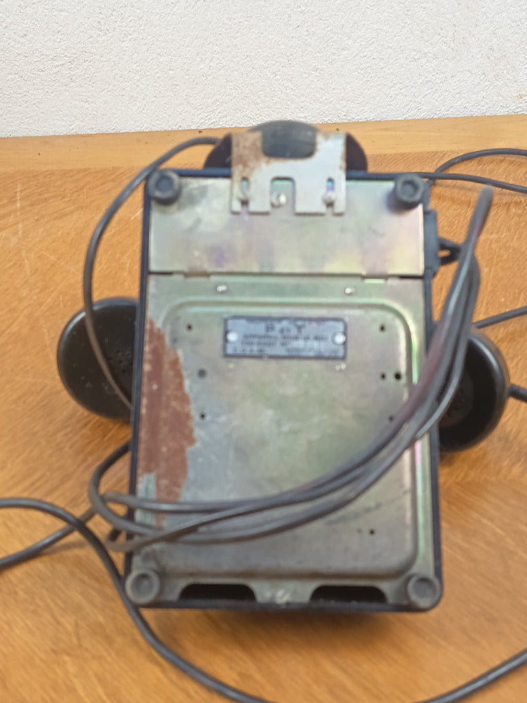 Téléphone ancien U43 PTT en bakélite noire avec cadran rotatif transparent et combiné