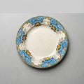 Compotier ancien Boulenger Arago en terre de fer polychrome, cartouches bleus et roses jaunes et rouges, diamètre 22 cm et hauteur 6 cm
