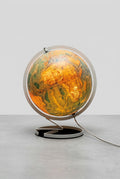Globe terrestre lumineux Cartes Taride vintage allumé sur son support en métal blanc