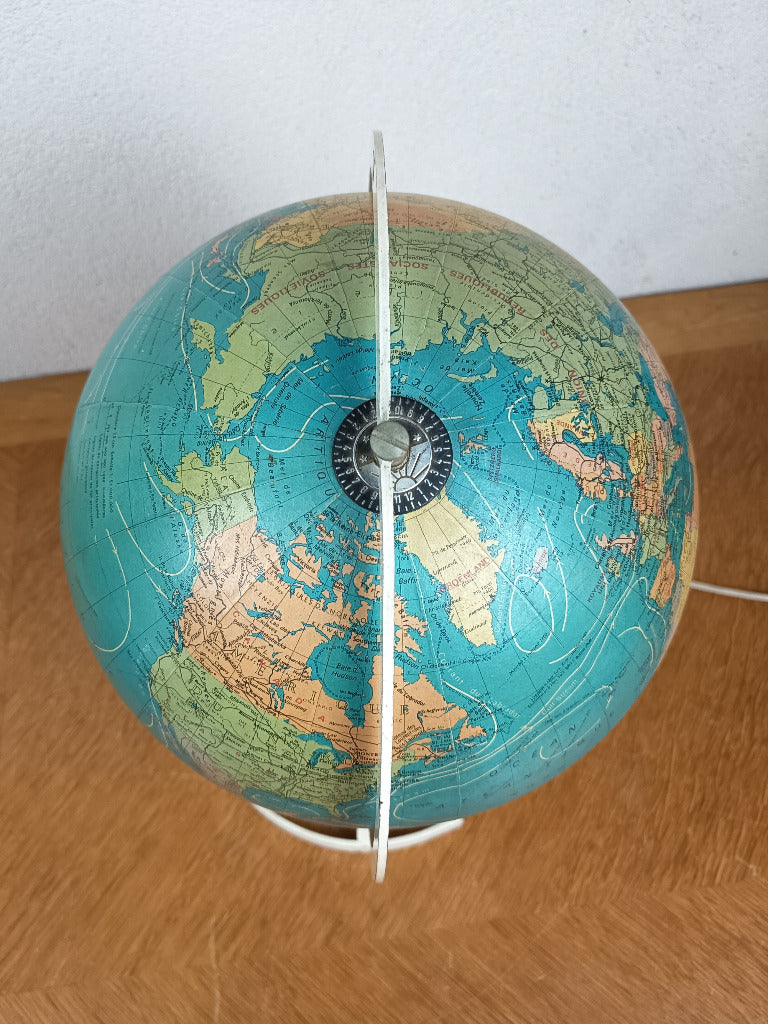 Globe terrestre lumineux Cartes Taride vintage allumé sur son support en métal blanc
