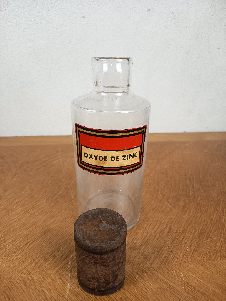 Flacon de pharmacie en verre avec étiquette Oxyde de zinc et capuchon métallique oxydé