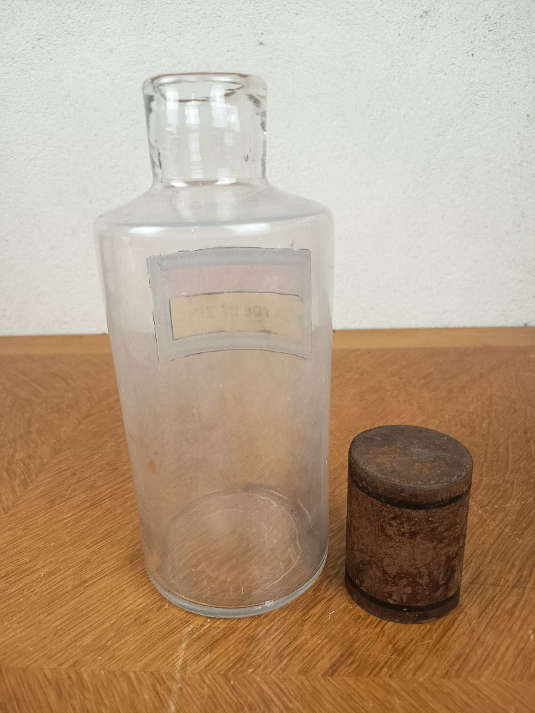 Flacon de pharmacie en verre avec étiquette Oxyde de zinc et capuchon métallique oxydé